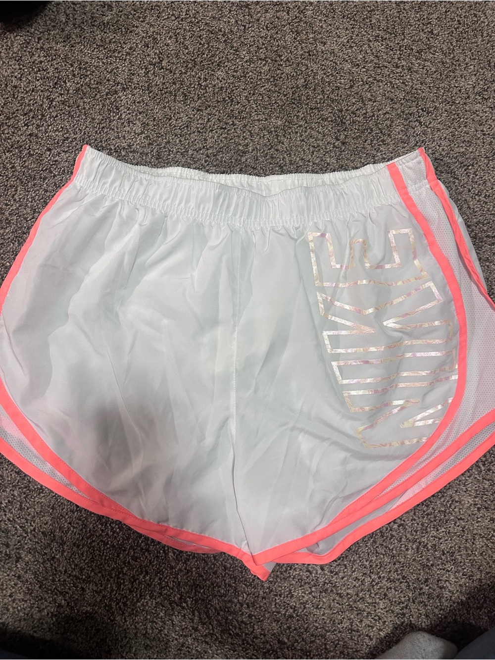 Nike White Athletic Shorts with Pink Trim and Iridescent Logo